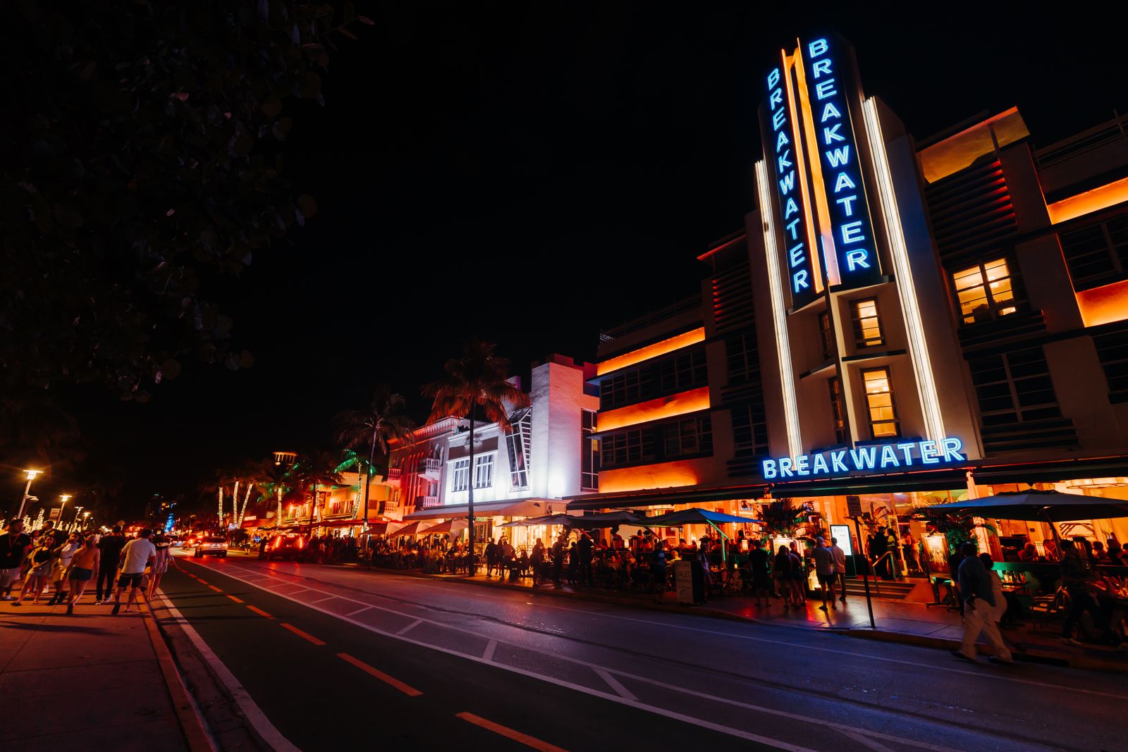 Vibrant nightlife in Miami's art deco district under neon lights